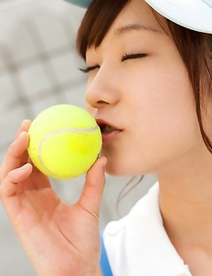 Kana Yuuki shows flexibility while playing with tennis ball