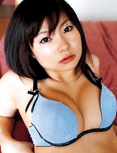 Akina Suzuki in panty takes bra off but hides her big jugs