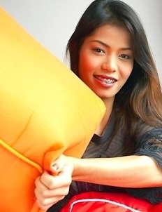 Check out amazing Ning Nara as she poses for the cameras in the living room. She looks so sweet and cute in her sheer t-shirt, but she knows that she