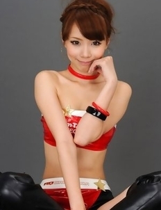 Ari Takada in long boots is really playful at photo session
