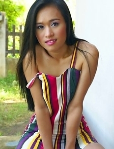 Lena Jung lying down and she has nothing but freakiness on her mind. She raises her skirt up and shows off her hot body.