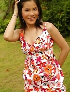 Nadear Beeker commences pushing her dress down and revealing her perky tits.