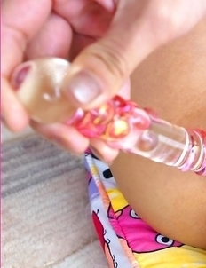 Patt Pandava sits down on a bed and she begins to feel very kinky. She decides to let her hands go on an adventure as she fondles her body.