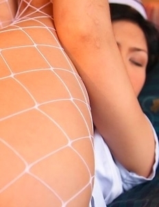 Gena Temer has her stethoscope and she is ready to heal you. She leans back on a sofa with her long sexy legs spread open.