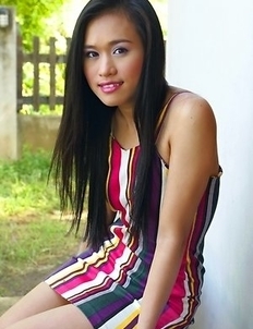 Lena Jung lying down and she has nothing but freakiness on her mind. She raises her skirt up and shows off her hot body.