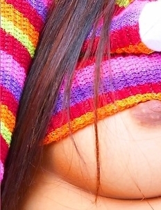 Laurence Li strips off her panties and shows her hairy pussy. She rubs on her pussy and makes herself hornier.