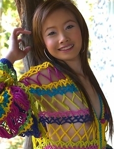 Check out gorgeous Ferrari Fai as she poses in her knitted dress.