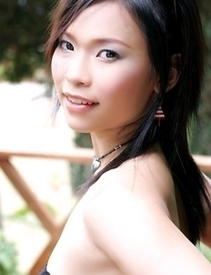 Check out amazing Ae Marikarn as she poses for the camera. She is dressed up in tight, red dress made out of leather.