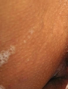 Extremely sexy Achara Raiwan is in her bathroom and she is wearing a cute bikini suit. She sits in the bathtub and slowly starts taking it off.