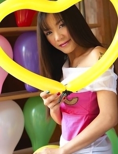 Cookie Wanwalee is home alone after the great balloon party se just had. She is still surrounded by lots of colorful balloons and she is having so muc