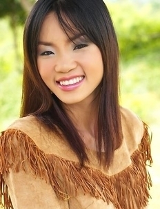 Christina Yho models her best cowgirl outfit as she begins touching herself and rubbing on her pussy.