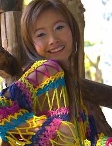 Check out gorgeous Ferrari Fai as she poses in her knitted dress.
