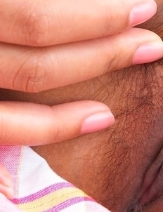 Amie Copony is a beautiful young babe that has a remarkable smile. She models next to a tree as she wears a sexy dress.