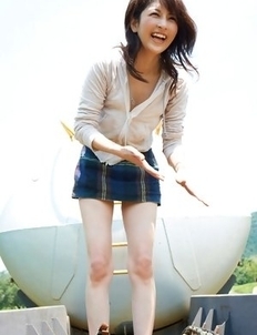 Neo babe in short skirt loves playing in dangerous places