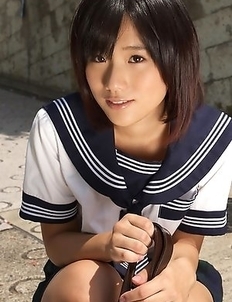 Japan teen Yuzuki Hashimoto in sailor gal uniform is playful outdoor