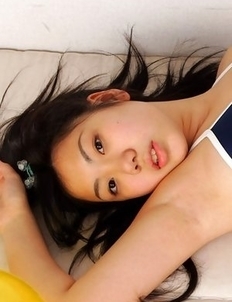 Miho Takai in nylon outfit plays with ball and on desks