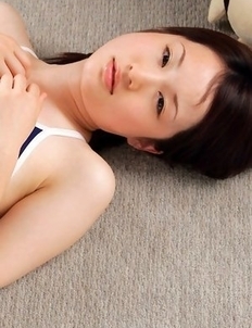 Naoko Sawano in swimsuit puts pillow between her sexy legs