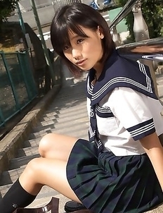 Japan teen Yuzuki Hashimoto in sailor gal uniform is playful outdoor