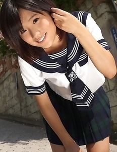 Japan teen Yuzuki Hashimoto in sailor gal uniform is playful outdoor