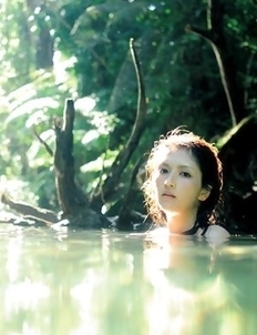 Neo babe in white dress loves feeling her body in water