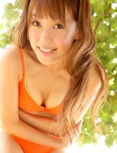 Nozomi Kawasaki is naughty and spreads legs on the beach