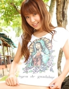 Nozomi Kawasaki is naughty and spreads legs on the beach