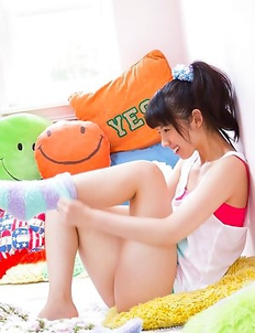 Rina Koike in socks and colorful bath suit is so playful
