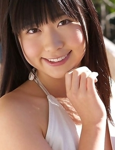 Hijiri Sachi in shorts and bra enjoys sun on her curves