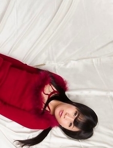Brunette in red Moeka Kurihara teasing you with her juicy barely legal pussy on a bed
