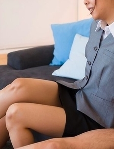 Mio Yoshida wearing a strict outfit during her hot footjob affair