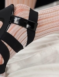 Stunning young girl Ayano Hidaka showing her feet in a white pantyhose