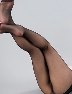 Nerdy redhead with glasses Chie Kobayashi giving a great footjob in a POV gallery