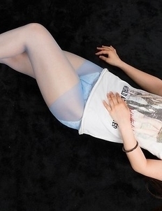 Dark-haired JAV goddess Sana Iori flaunting her pantyhose-clad legs in HQ