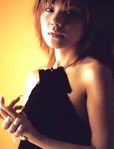 Yuko Nakazawa loves her dog and wearing fancy dresses