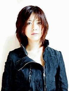 Miho Shiraishi exposes big tits and naughty attitude at cam