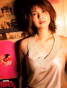 Miho Shiraishi exposes big tits and naughty attitude at cam