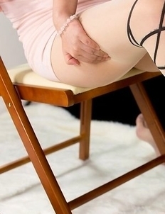 Strict seductress Kaede Oshiro flattens this dude's cock and balls for his pleasure