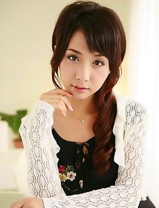 Office lady Tomoe Hinatsu is posing