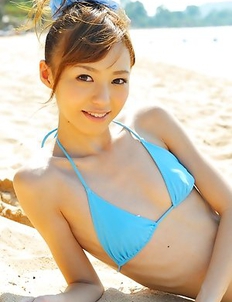 Aino Kishi in blue bath suit is a true beauty enjoying sand