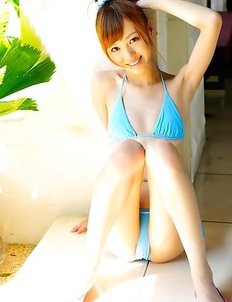Aino Kishi in blue bath suit is a true beauty enjoying sand