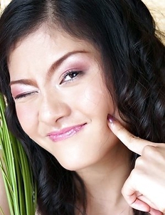 Hot Asian girl Mona Choi puts it in the pussy  red vibrator