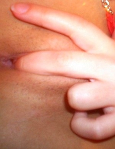 Smoking hot asian teen babe spreads her pussy lips