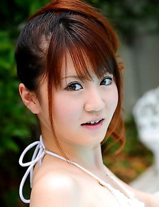 Lovely Japanese babe enjoys posing