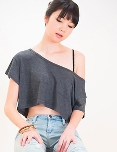 Slim seductress Anna Matsuda gives a footjob and sucks on her own toes for you