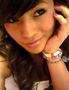 Busty chick infront of the mirror