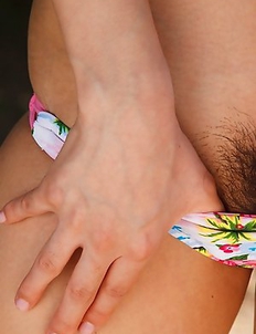 Kana Yume shows nude playful tits and hairy cunt in nature