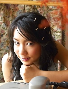 Dollar Dolaya takes out a red dildo and she places it inside of her vagina.