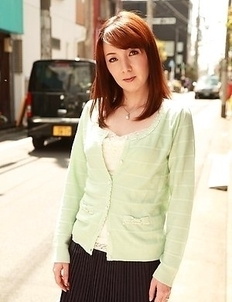 Chika Sasaki in green sweater and short skirt