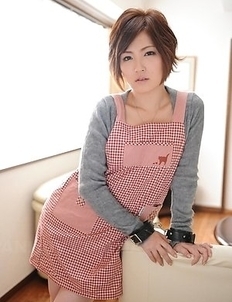 Kaede Oshiro with busy mouth shows sexy legs