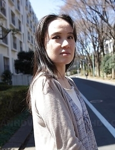 Junko Nishimura is an Asian lady presenting